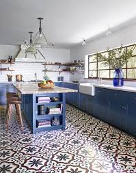 blue and white ceramic tiles decorating kitchen wall backsplash